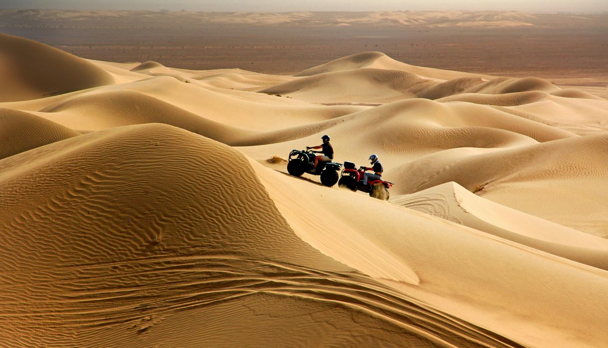 Experience thrilling quad biking across Merzouga's stunning desert dunes.